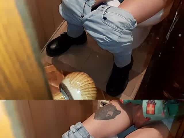 I caught a stranger masturbating on the latrine in a public restroom and we came at the same time