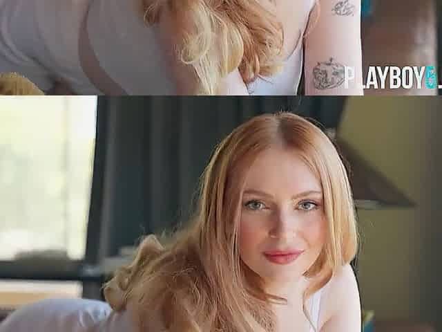 Large fake melons redhead pornstar Maya Kendrick shows bushy snatch in the stripped