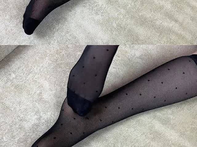 Foot headmistress likes to rub her feet in ebony nylon nylons