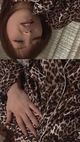 She Was Wearing Something Like a Leopard Print and Was Roughly Inserting Sex Toys.