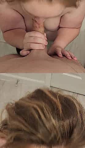 Curvy redhead gets on her knees and swallows for the 1st time