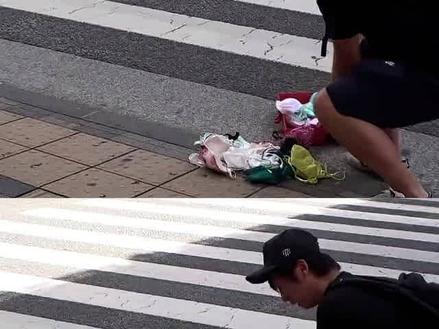 Asian girl on her knees giving blowjobs handjobs for 4 guys
