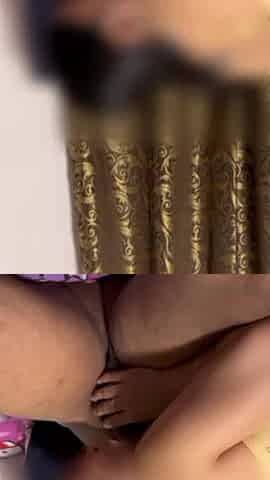 A perfectly proportioned Asian girl with full hips is penetrated from behind.