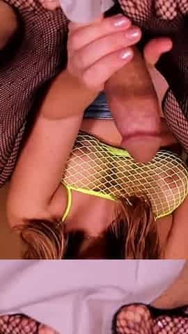 Kinky footjob in black fishnets