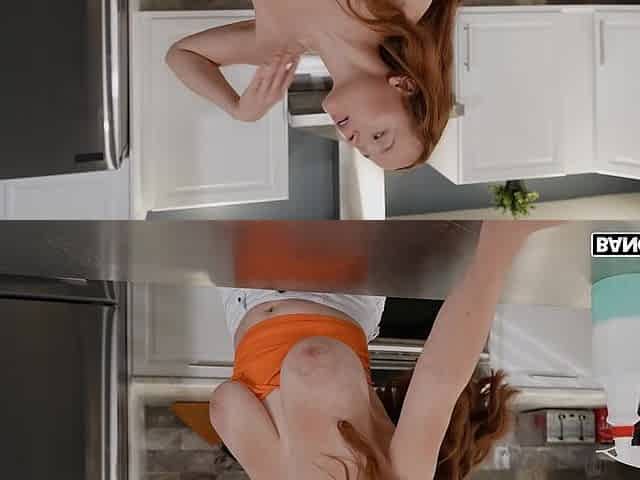 Red Eviee shows off her big natural tits