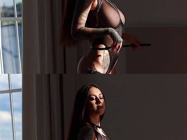 Busty babe playing with her big boobs
