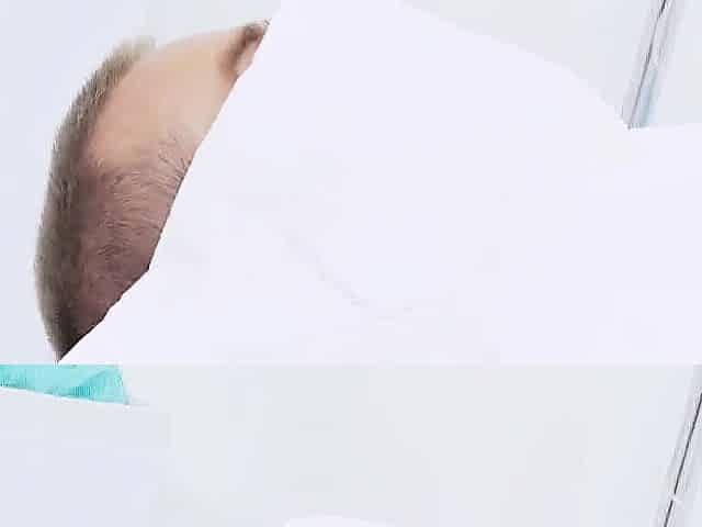 Black nurse takes care of patient