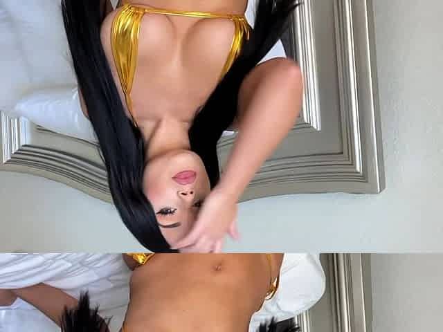 Busty babe playing with her big boobs