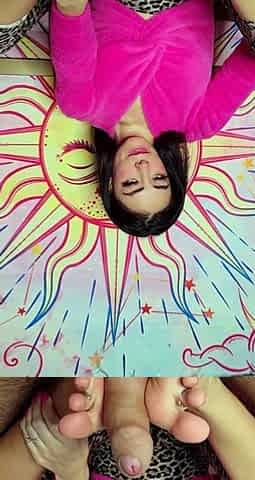 Brunette with foot fetish rubs big dick with her feet in POV
