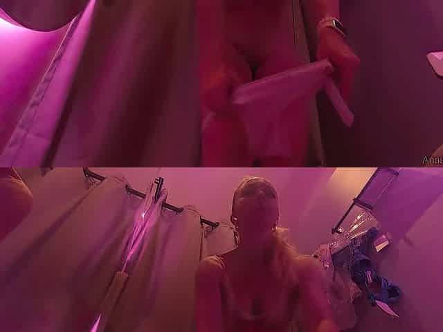 In a public fitting room, a nude beauty with a soaked booty tries on pants and underclothes. Caught mastu