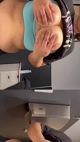 Chubby Girl Bouncing Tittes in Public Restroom