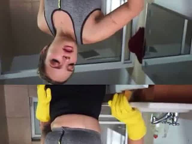 Latina maid shows off while cleaning