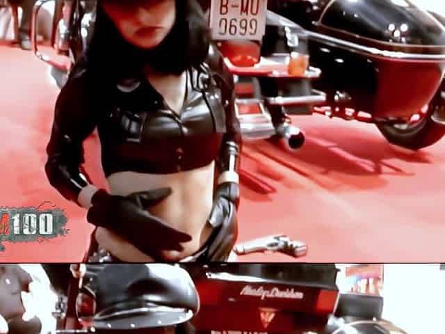 Samantha Cruse in leather on stage at the Erotico de Barcelona Film Festival in 2006 - MMM100