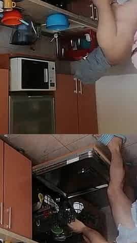 Couple Having Fun in the Kitchen. Sexy Wife Doing Chores in the House Naked