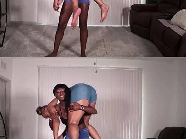 2 hawt black beauties carrying every other and giving a kiss