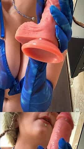 A Girl in Beautiful Lingerie Is Having Fun with a Dildo