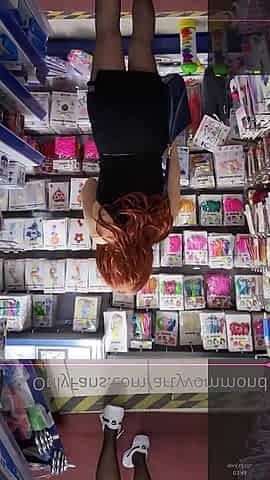 Redhead Orgasm While Shopping with a Remote Vibrator