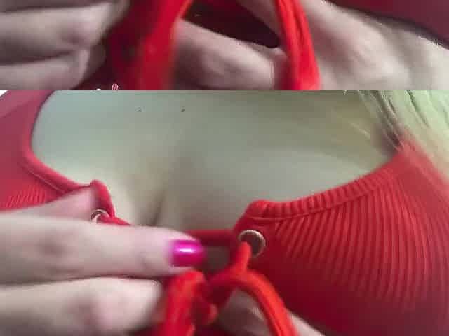 Carlycurvy in taut orange short suit