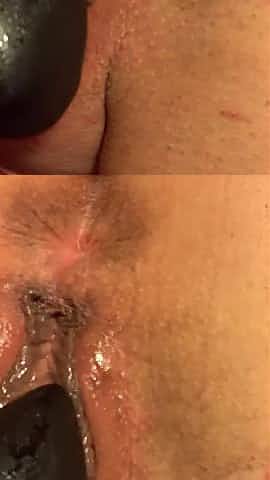 analplug and wet, swollen pussy with pussyballs inserted