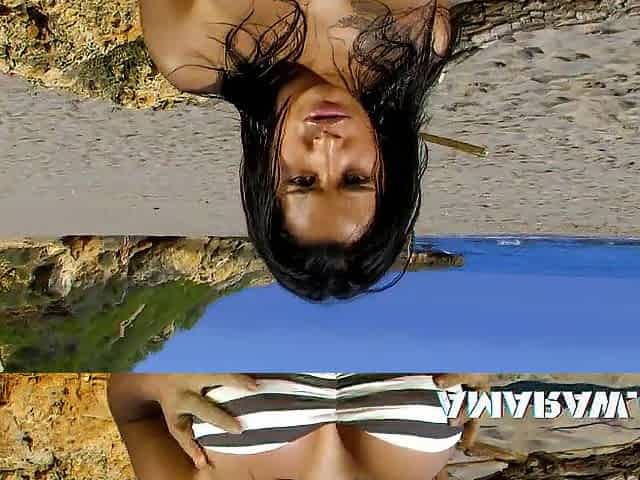 Brunette hair large boobs stunner Dolce Elektra doggystyle at the beach