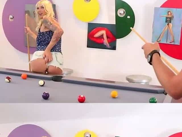 A blonde nymph with a tattoo likes doggystyle on a pool