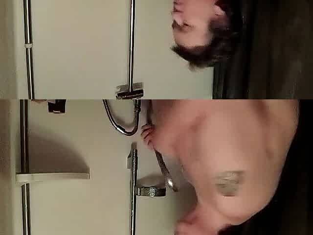 Jen is playing with her own titties in the shower
