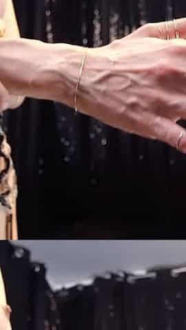 Rebecca Diamante Shows Her Hands' Veins in Topless