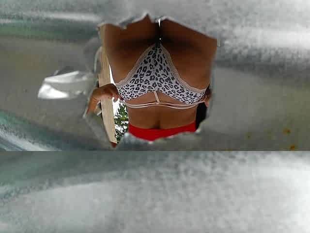 Camera Records in Beach Dressing Room Sexy Latina