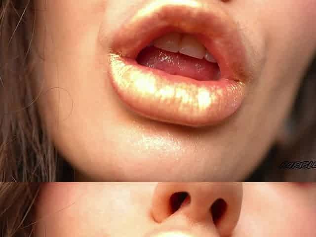 Extremely Shiny Metallic Golden Kiss Close up