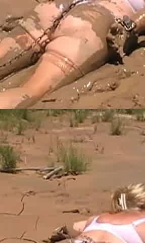 Julie Cunningham in Lingerie Wriggles Hard in Mud Hogtied with Chains. Sploshing Dirty Whore. Huge Tits Covered in Mud.