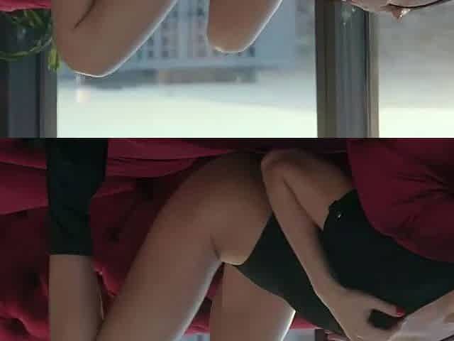 A ash-blonde woman in a dark-hued top with orgasm