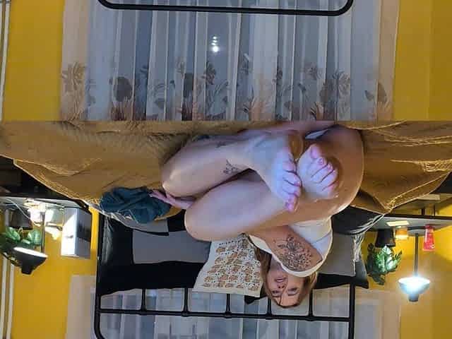 Young Busty Girl Shows Her Feet Naked