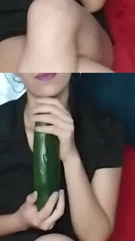 Argentine Masturbates with a Giant Cucumber up Her Ass