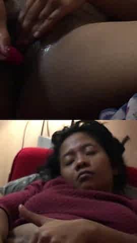 Sexy Indonesian Girl Relaxes with a Vibrator in Her Pussy