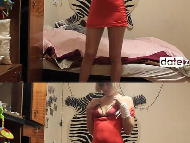 Datezone.com - Short-haired blond in a taut red costume masturbates her twat