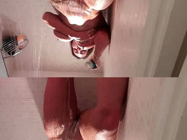 Hot babe with perfect big boobs taking shower