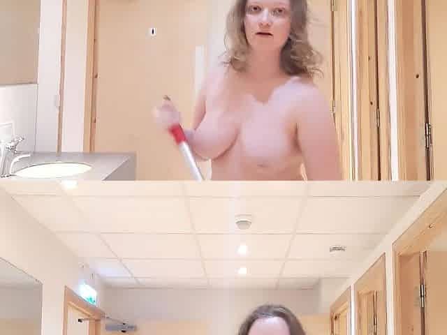 Topless beauty mopping public bath floor