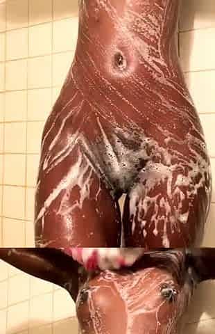 Sexy amateur chick taking a shower and masturbating