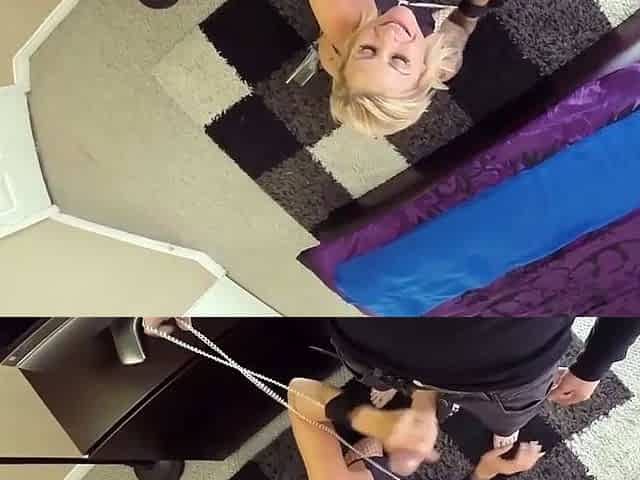 A blond nymph gives a passionate blowjob in a bedroom