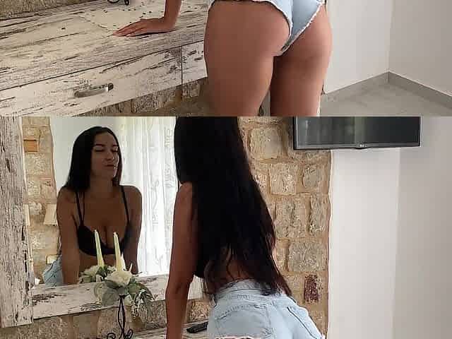 Brunette hair with large bazookas masturbates in front of the mirror
