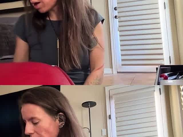 MILF babe masturbates by the fireplace