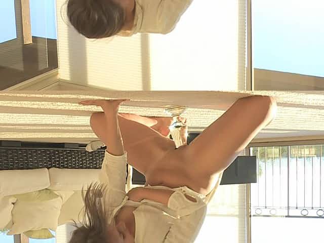 See if she can fit the big glass dildo into her tight pussy