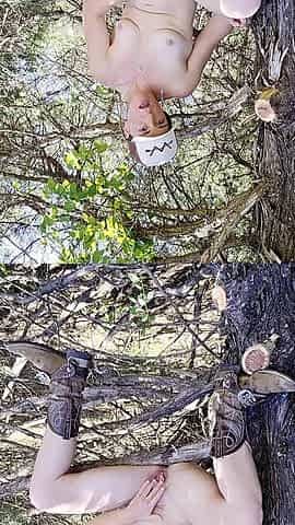 Redhead Finger Fucks Pussy in Tree