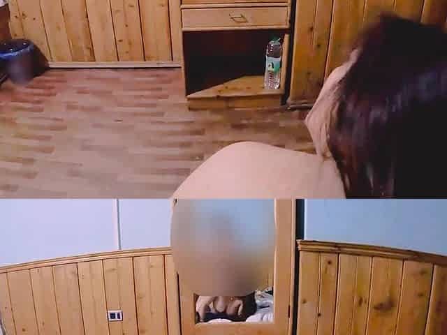 Passionate Couple Making Love in a Hotel Room