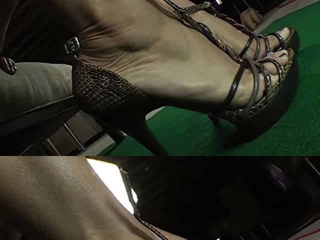Lady With A Nice Cleavage Puts Sexy Heels On Her Mature Feet And Poses