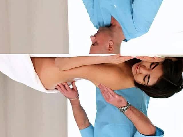 Masseur pleases a slim brunette
