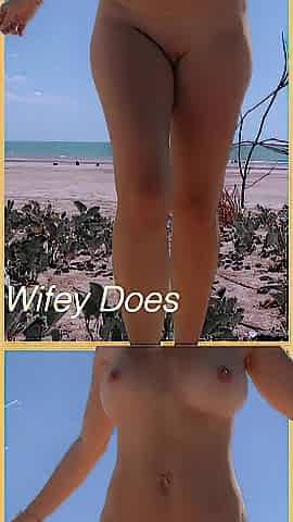 Wifet is fully in nature's garb at the beach