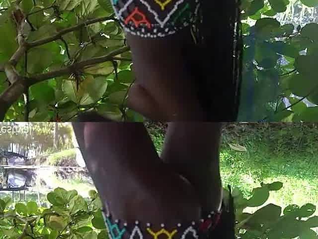 Slim Nigerian tribe cutie masturbating on a tree