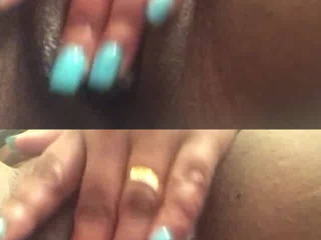 Black gratifying herself