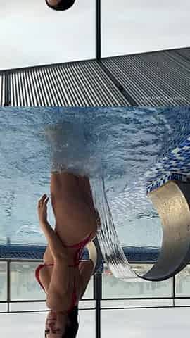 Tease in Micro Bikini in the Pool